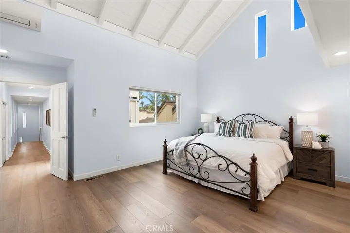 The vaulted ceilings add style and volumes of space to this primary retreat