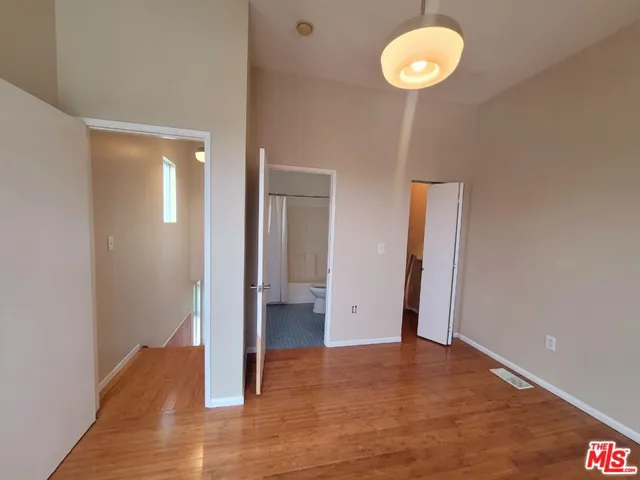 Primary Bedroom with private bathroom & walk-in closet