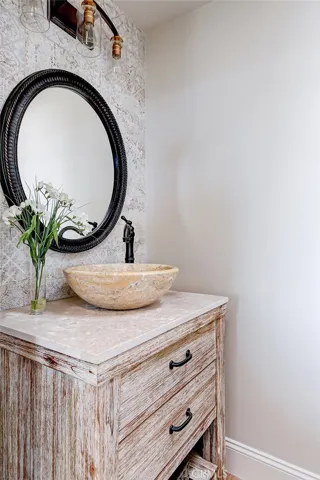 Entertaining floor has a powder bath tucked away.