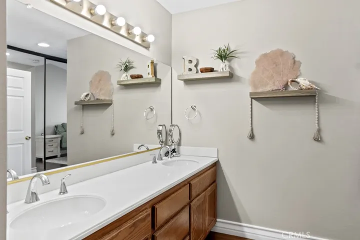 Dual sinks and loads of storage in the primary bathroom