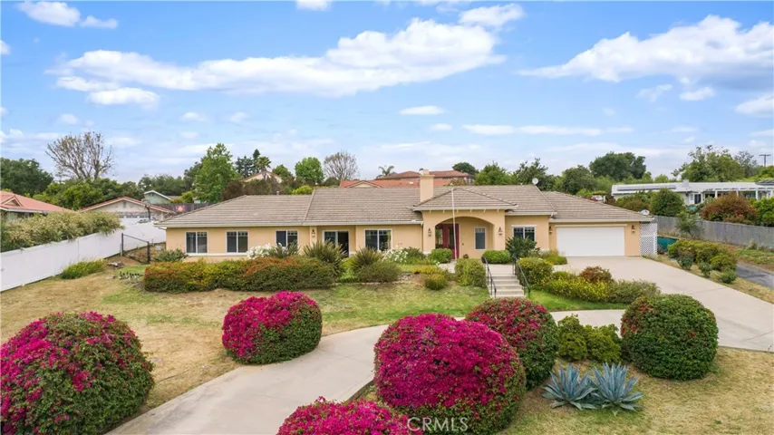 Beautiful curb appeal with plenty of parking.