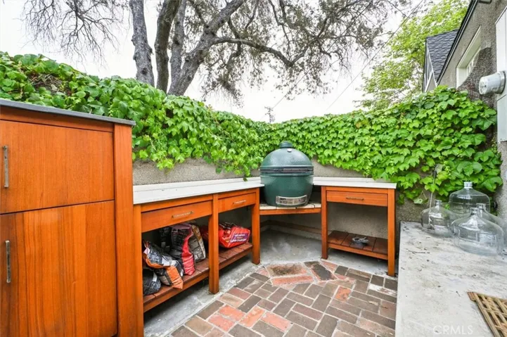 Walled kitchen garden with bbq area and Green Egg included off kitchen.