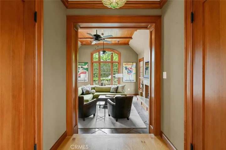 A short passage with walk-in pantry and 1/2 guest bath.