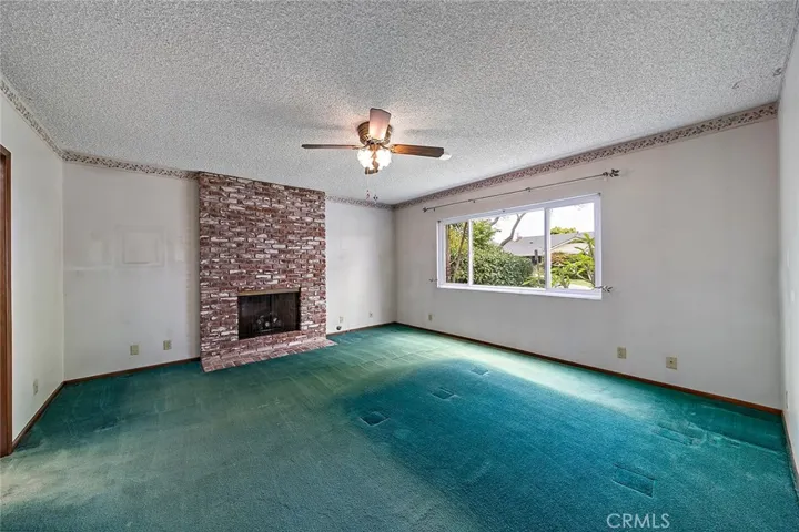 Primary bedroom with a fireplace