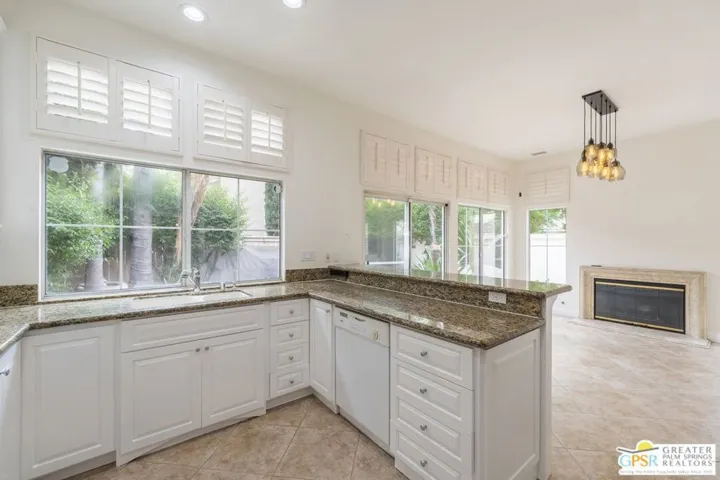 Kitchen opens to family room for entertaining guests.
