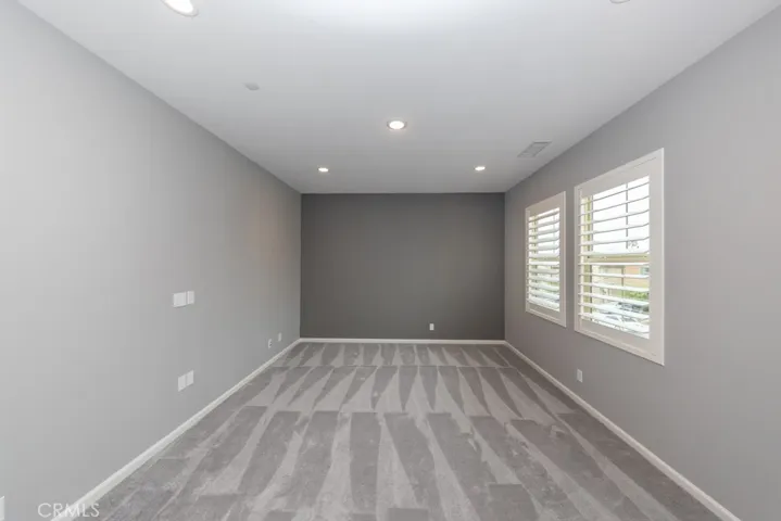 bonus room / media room / "loft" area (could become a 5th bedroom by adding doors and closet)