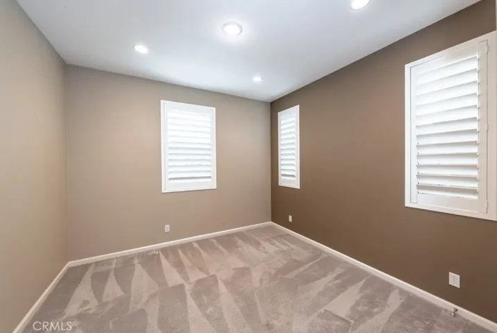 Downstairs bedroom. Thanks for wearing booties on all carpeted areas