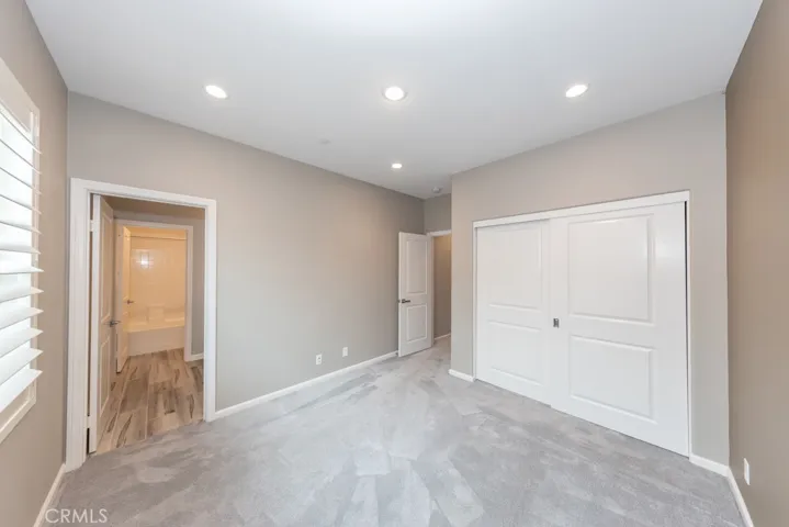 inside bedroom 3 looking towards very spacious ensuite bathroom area