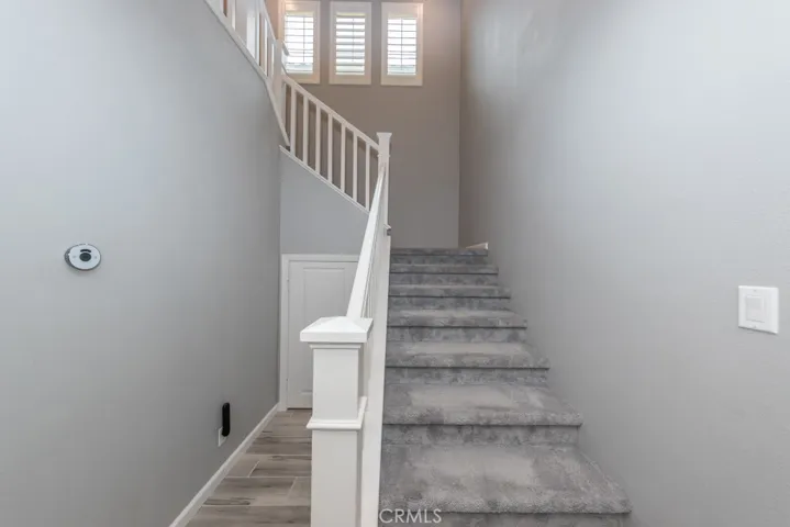  time to head upstairs to see the bonus room/loft area and next three bedrooms & baths!