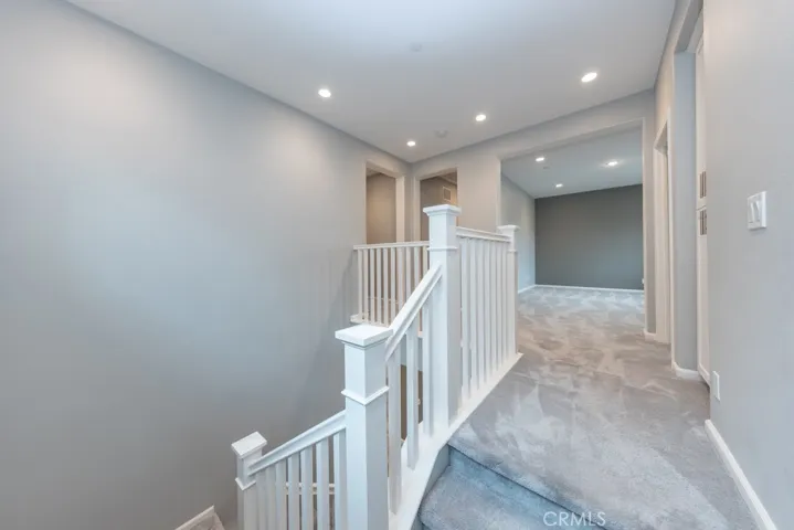 top of stairs looks straight into bonus room / "loft" room