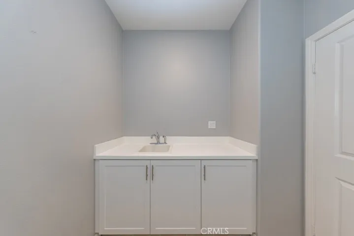 sink and more cabinets in laundry room