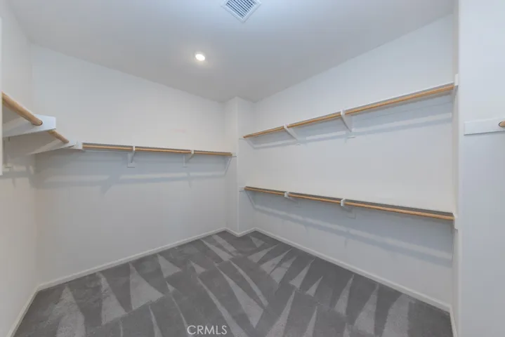 spacious primary bedroom closet
