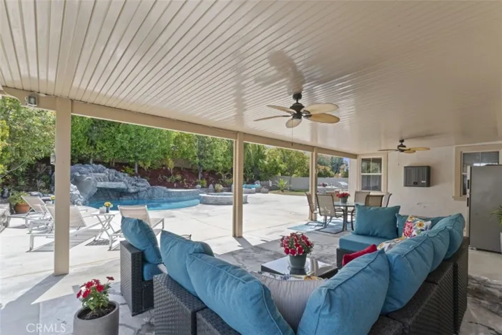 Lots of covered backyard seating and sunning:-)