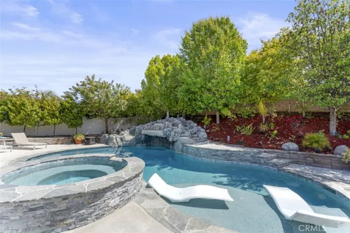 Pool and Backyard light up like a parade at night.