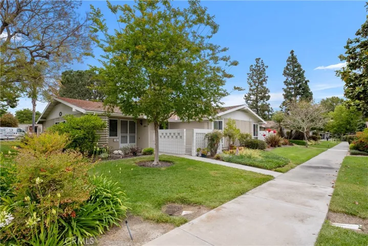 Sidewalk leading to Carport