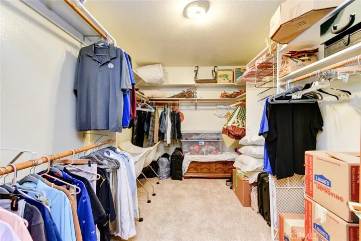 WONDERFULLY LARGE WALK-IN CLOSET IN PRIMARY BEDROOM