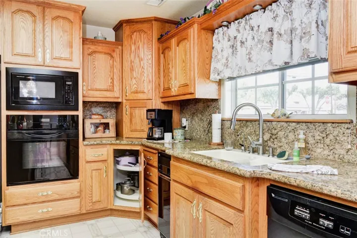ADDITIONAL JENN AIR OVEN AND BUILT-IN MICROWAVE.   LAZY SUSAN CABINET FOR EASY ACCESS