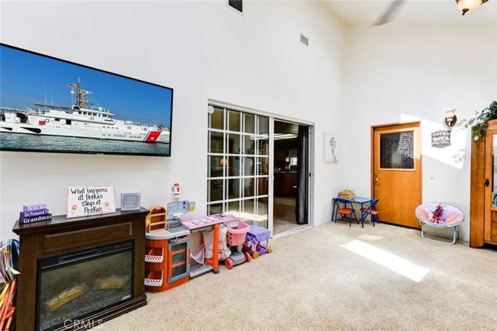 BONUS ROOM ADJACENT TO THE FAMILY ROOM WHERE THE KIDDOS CAN HAVE A GREAT TIME WITHOUT DISTURBING THE ADULTS