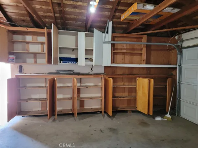 garage with lots of cabinets