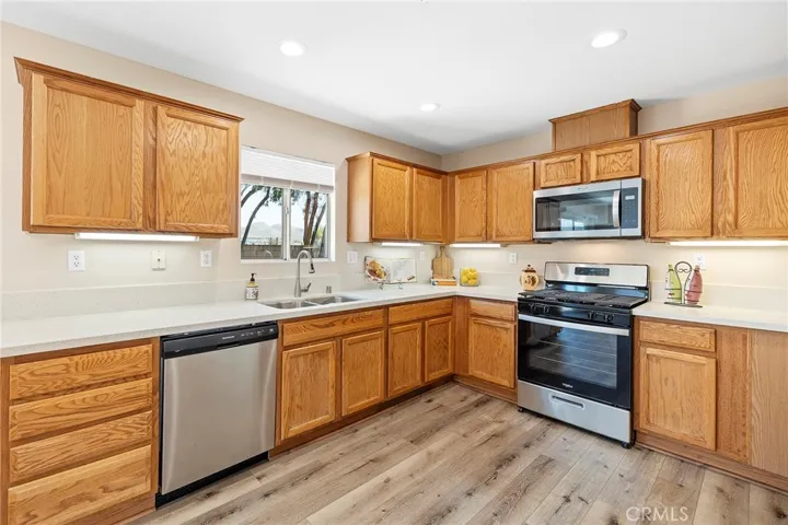 New stainless sink & faucet, undercabinet lighting