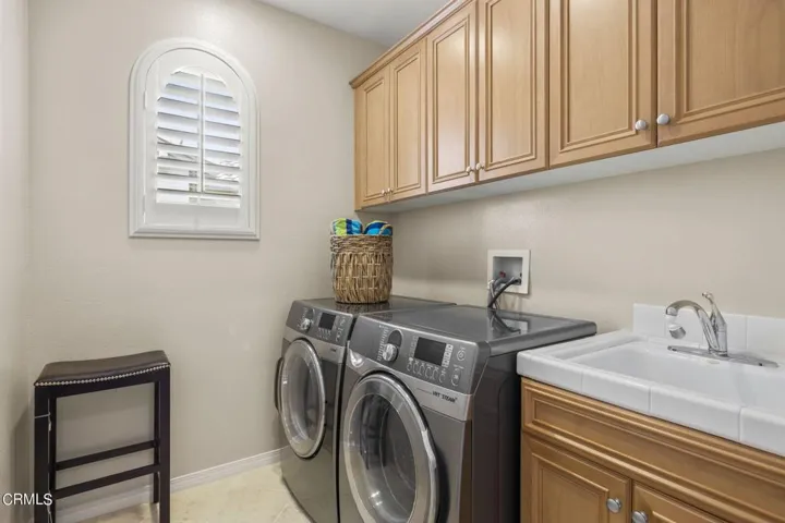 Laundry room with sink
