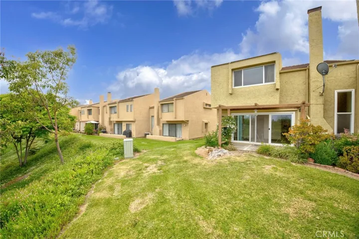 3 bed, 2.5 bath end unit, open floorplan, garage, pool, near top schools.