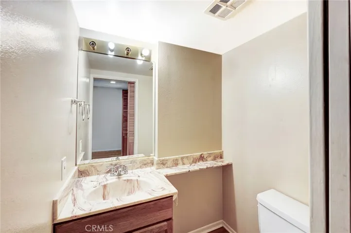3 bed, 2.5 bath end unit, open floorplan, garage, pool, near top schools.