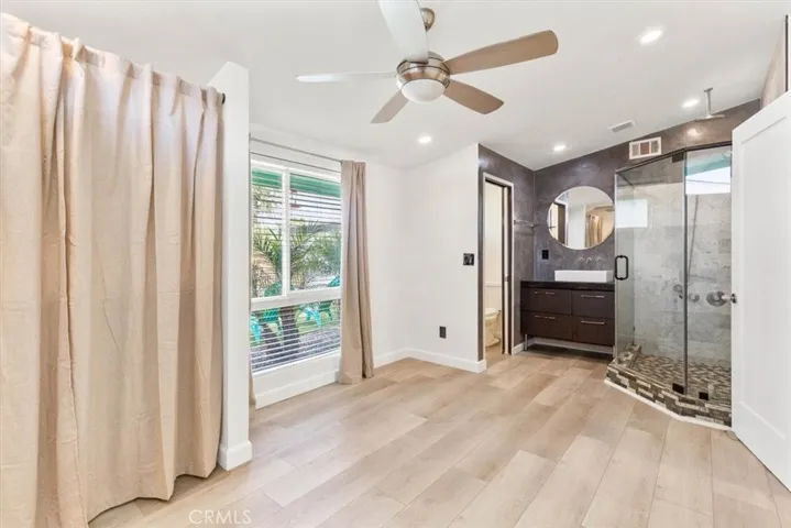 front secondary bedroom with ensuite bathroom
