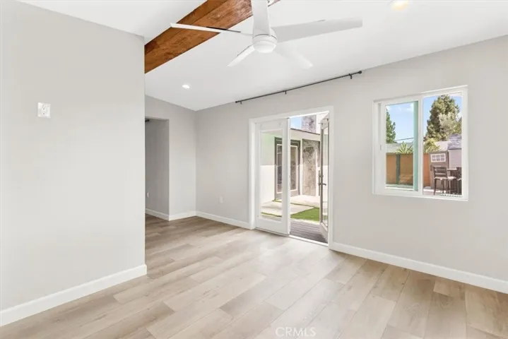 Primary bedroom with ceiling fan