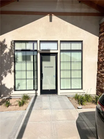 Suite 105 (back door)