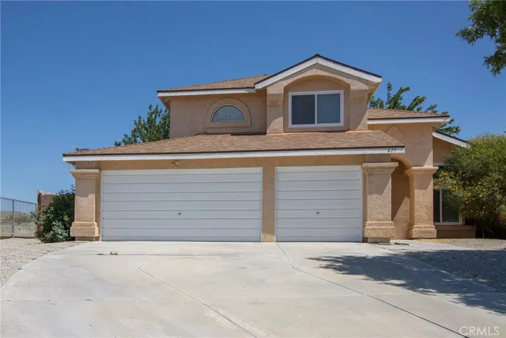 Front View - Three Car Garage