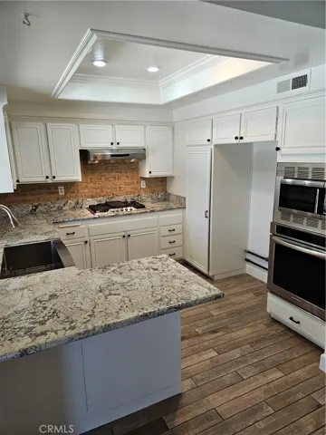 Kitchen w great cabinet space, pantry,newer appliances