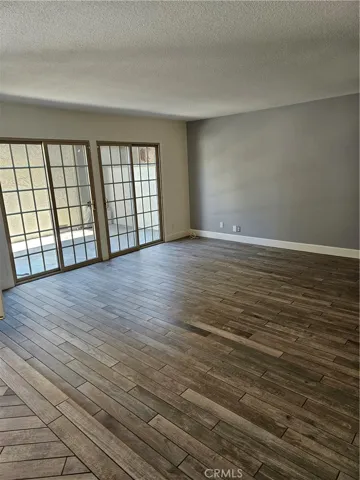 Living room view showing slider to private front patio area