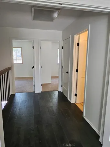 Upstairs Hall with beautiful hardwood floor
