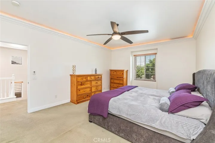Relax in this spacious master bedroom.