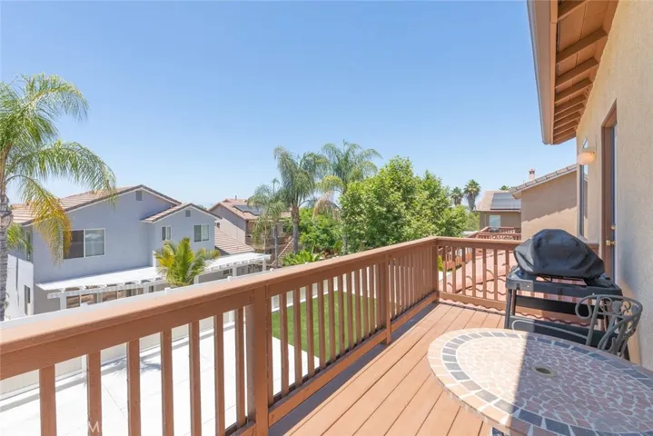 Enjoy the beautiful view from this spacious balcony, perfect for outdoor relaxation and dining.