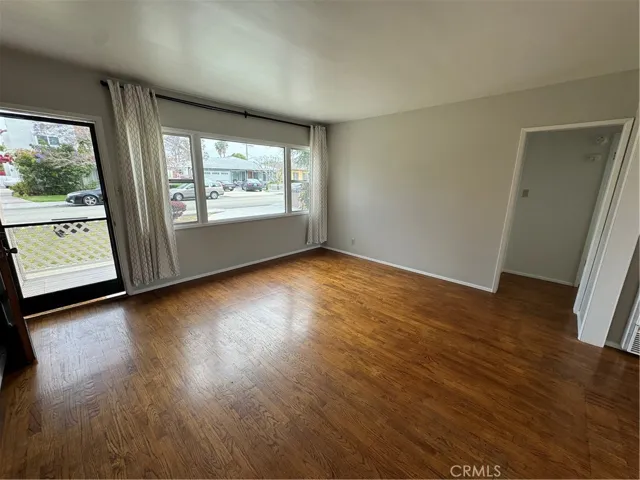 Big, picture windows and a screen door bring in the south-facing natural lights