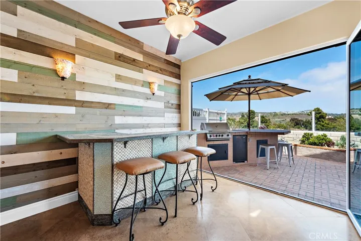 This is where you could put a dining table in lieu of bar.