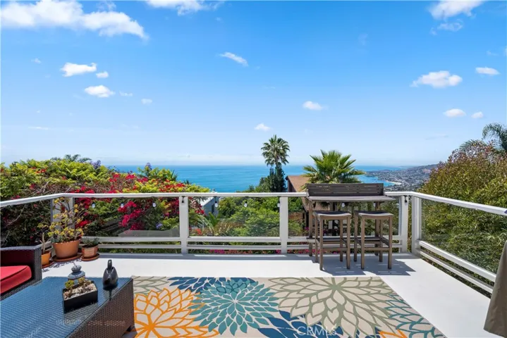  Easily accessible large decks perfect for year-round entertaining are found on all levels.