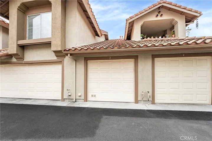 1 car direct access garage plus 1 assigned parking space