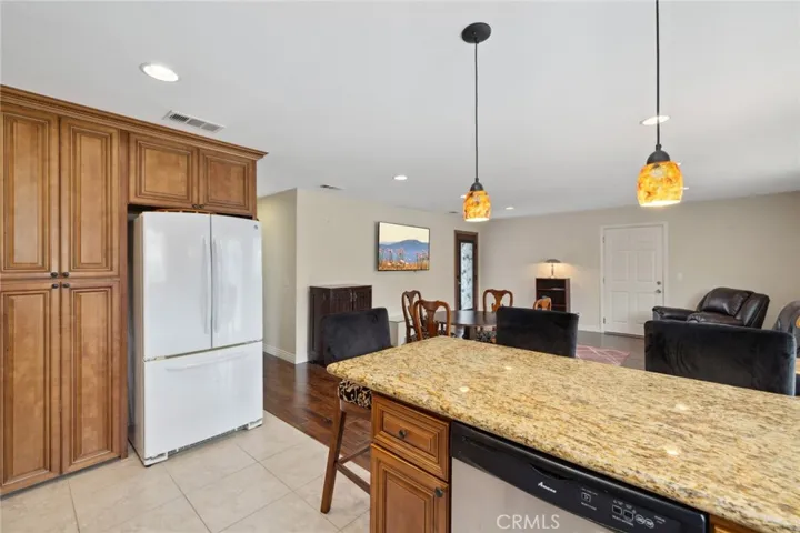 Stay engaged: Cook in the open kitchen while keeping up with your favorite sport, or show