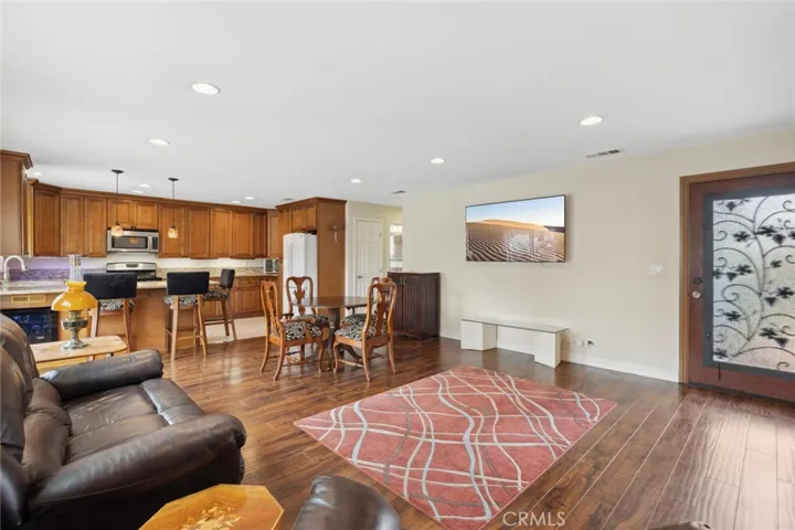 Modern Open-Concept Living: Spacious kitchen, dining, & living room combo