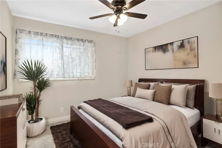 One of the two guest bedrooms, ceiling fan