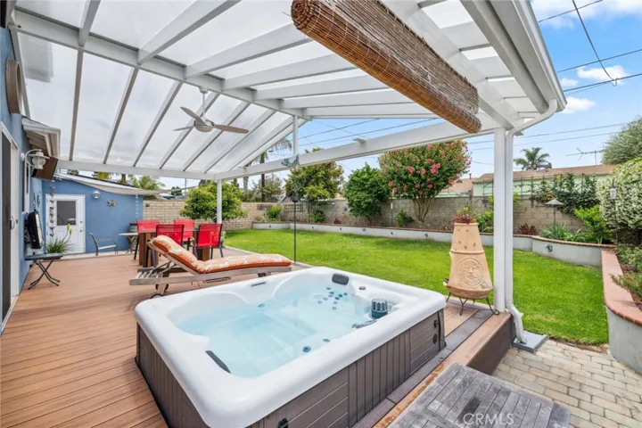 Outdoor living space perfect spot for relaxation, entertaining, outdoor dining and relaxing in the jacuzzi