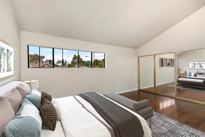 Large primary room with wall length closets.
*photo is virtually staged.