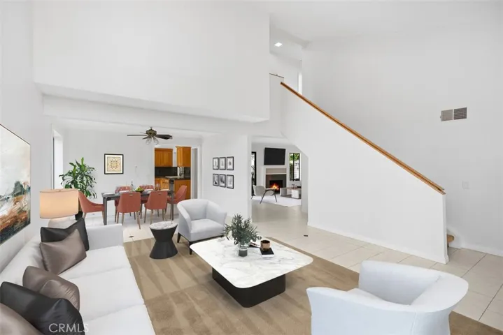 Welcome Home!  
Enjoy the spacious living room and open dining room.
*photo is virtually staged.