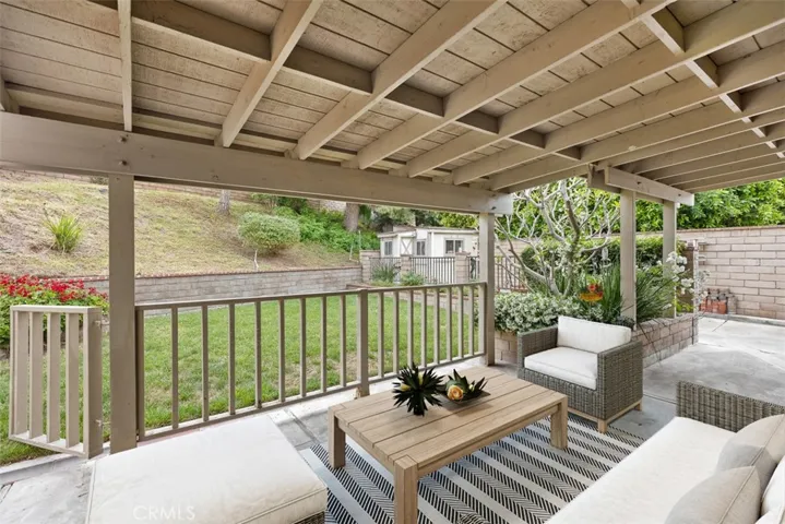 Relax on the large covered patio.
*photo is virtually staged.