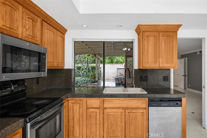 Kitchen with stainless steal appliances.