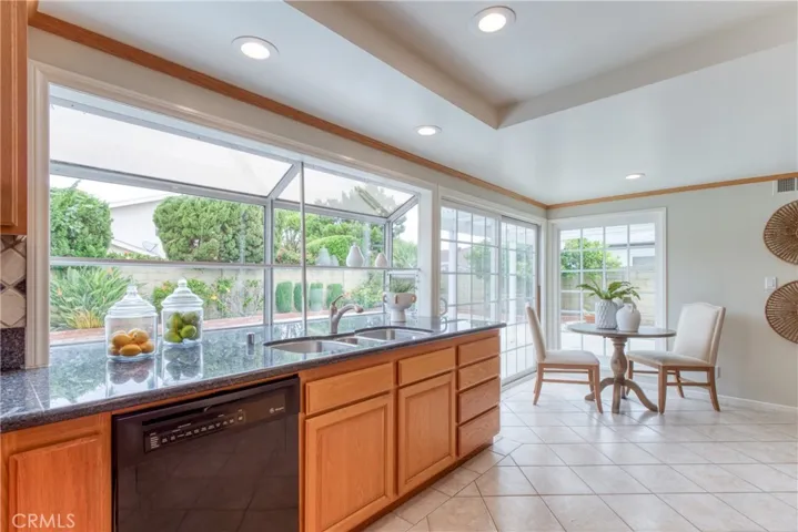 Kitchen with garden window over the sink creating an array of natural light to enjoy!