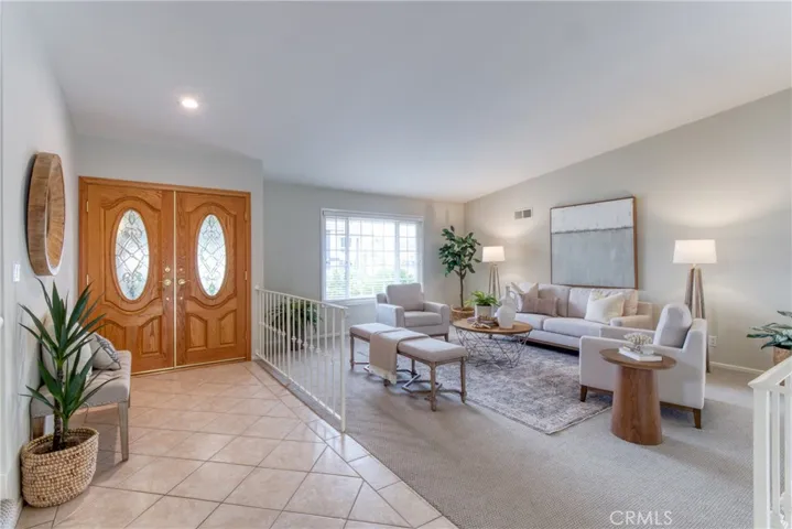 Open and spacious floor plan with vaulted ceilings, new carpet, new smooth ceilings, fresh paint throughout!